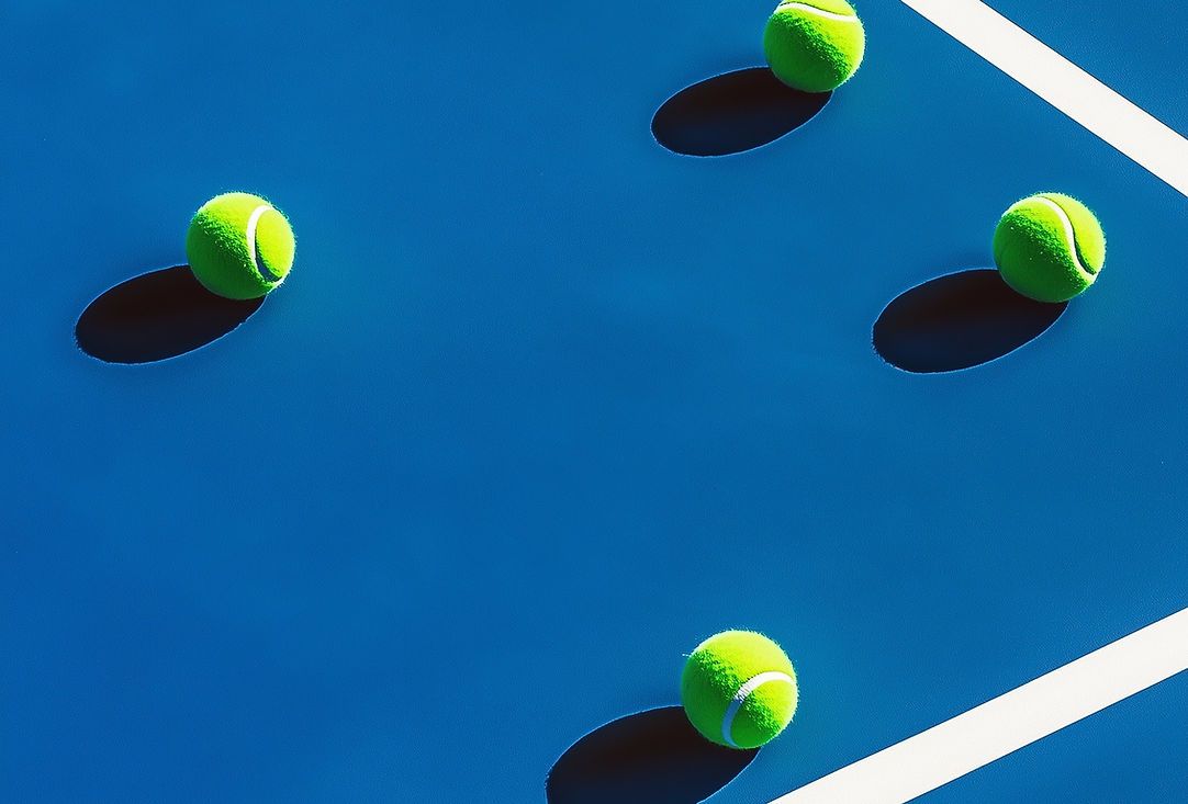 Tennis Balls on Court